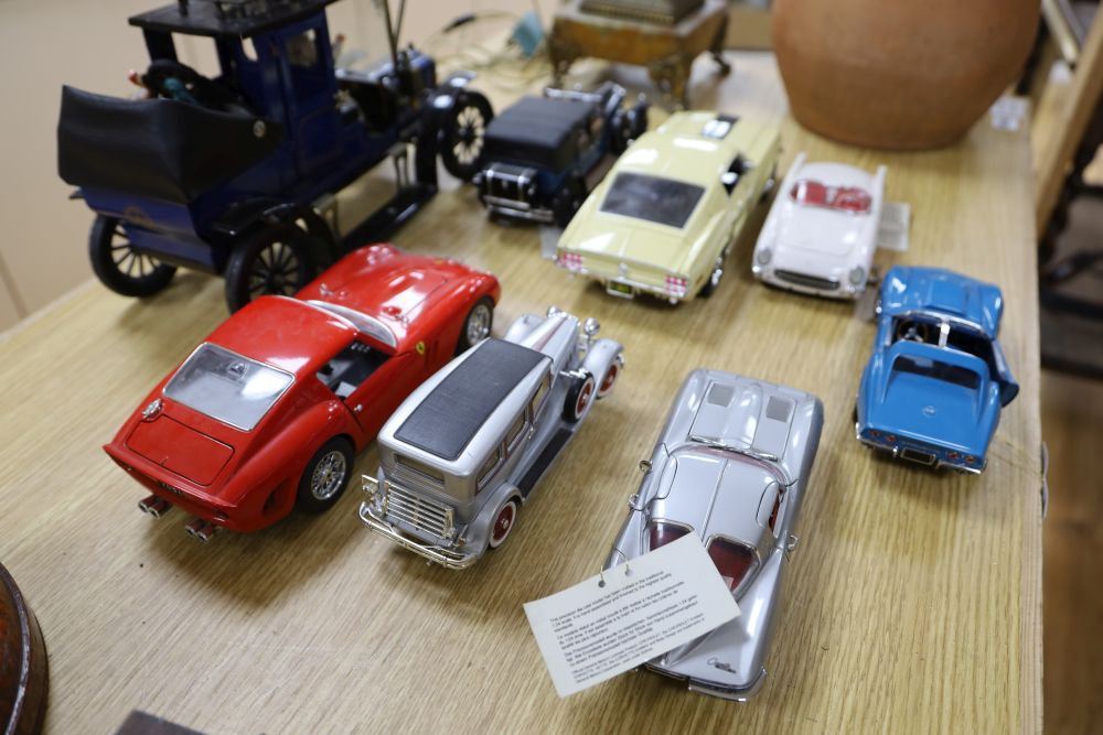 Eight tinplate model cars including a Ferrari and a Corvette